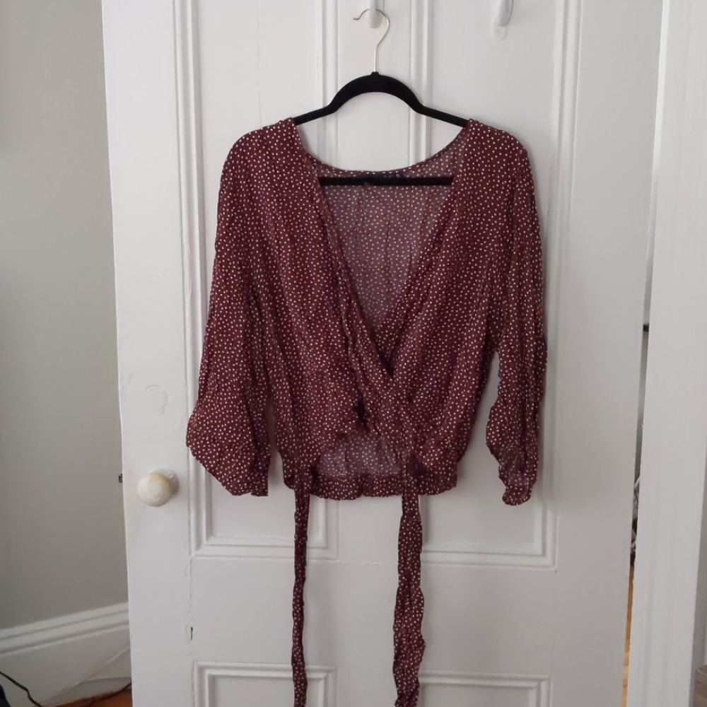 Polka dot wrap style maroon bell sleeve top